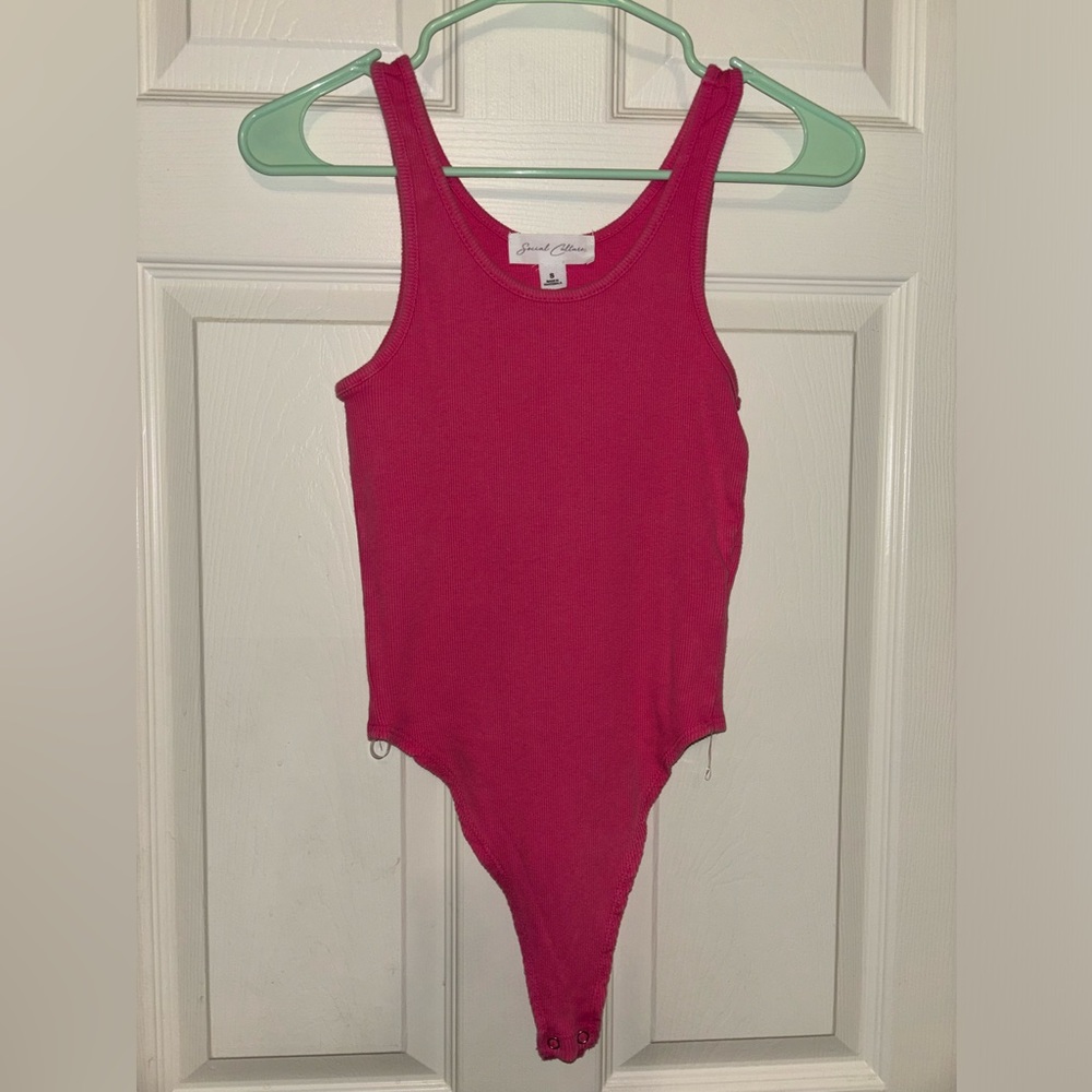 Hot pink body suit